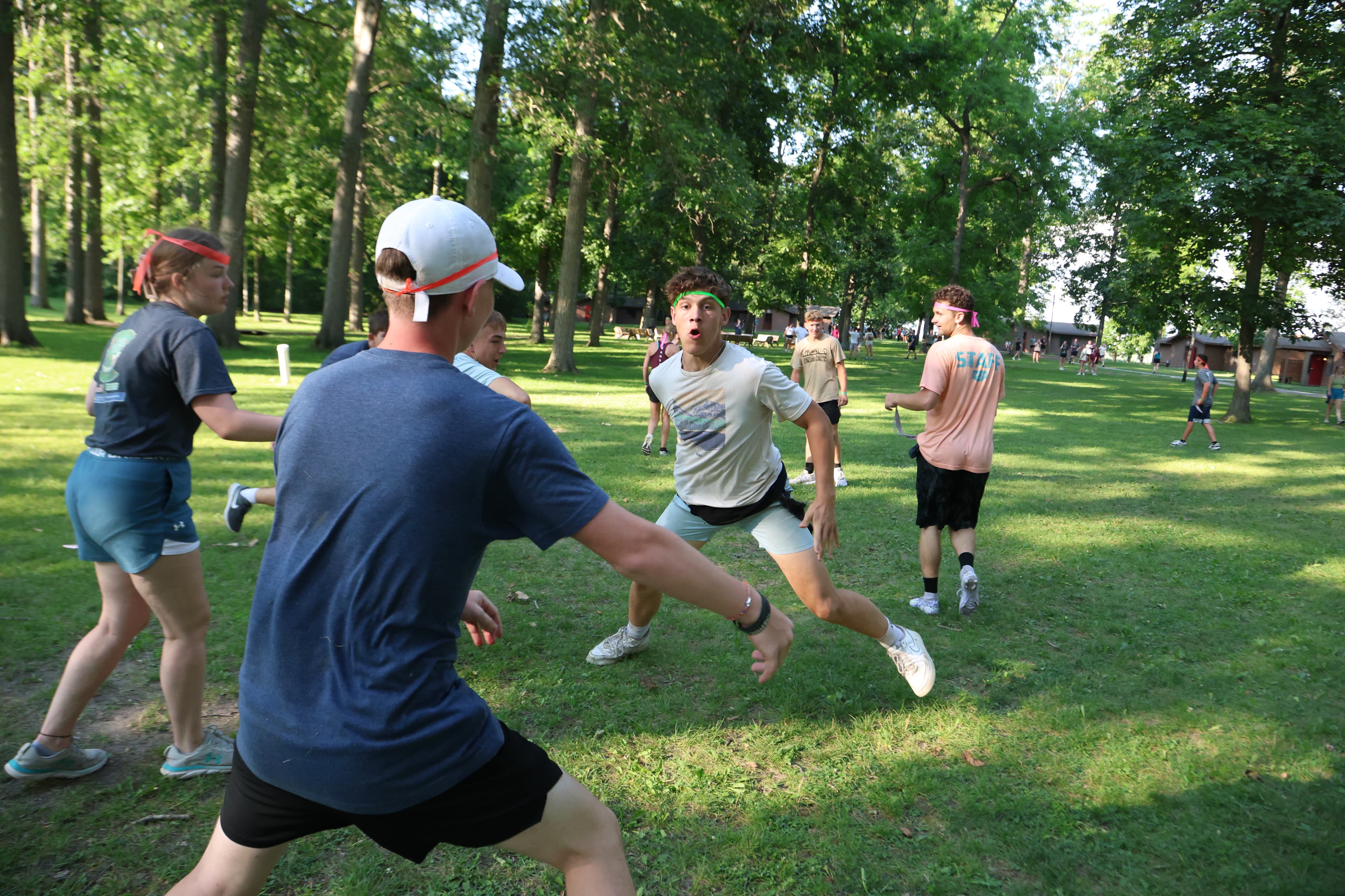 Recreation leader organizing camp activities