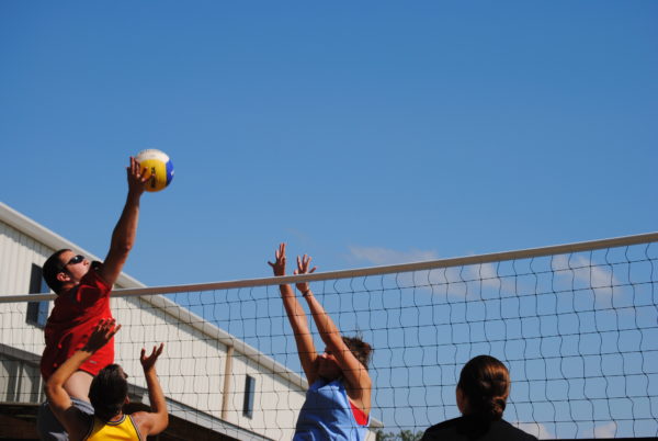 Playing volleyball